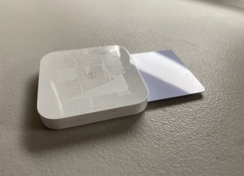 A white square object with a square object in it
AI-generated content may be incorrect.